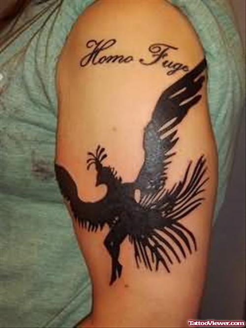 Unbelievable Bird Tattoo On Muscle