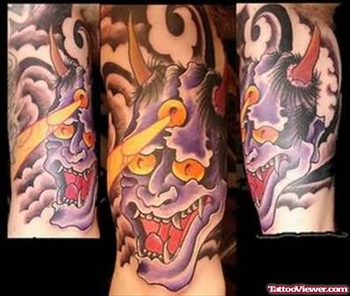 Devil Gargoyle Tattoo On Muscle