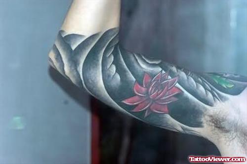 Lotus Tattoo On Muscle