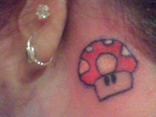 Red Mushroom Tattoo Behind Ear