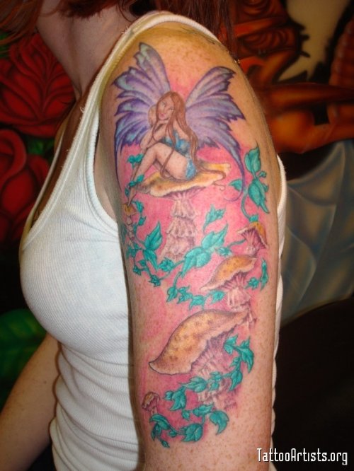 Fairy Sitting On Mushroom Tattoo On Left Half Sleeve