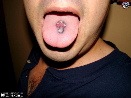 Red Mushroom Tattoo On Tongue