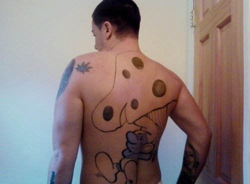 Outline Mushroom Tattoo On Guy Back Body