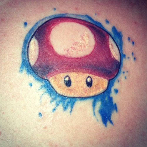 Impressive Red Ink Mario Mushroom Tattoo