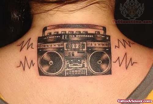 Cool Music Tattoo On Back