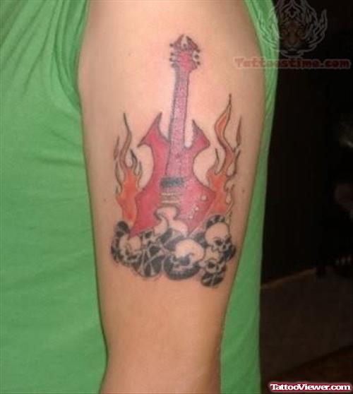 Red Guitar Tattoo On Muscle