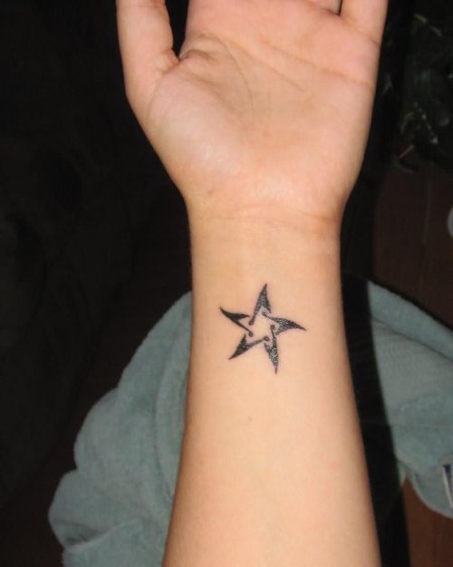 Star Music Tattoo On Wrist