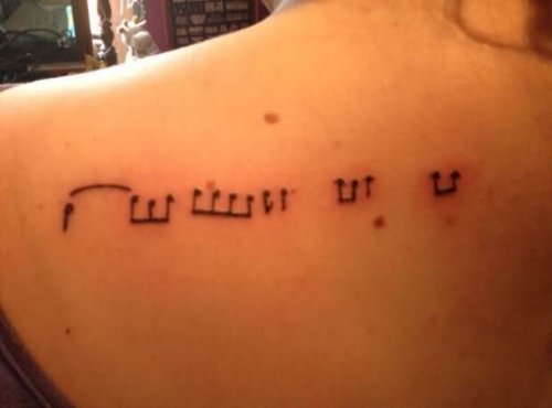 Left Back Shoulder Music Tattoo
