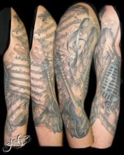 Amazing Grey Ink Music Tattoo On Sleeve