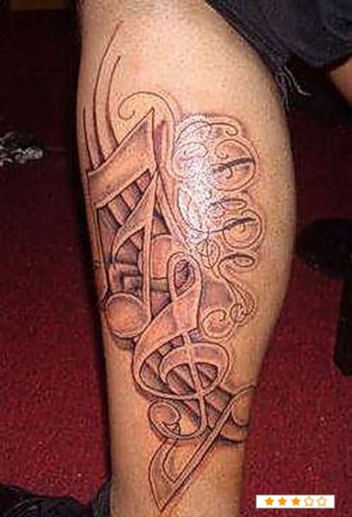 Grey Ink Music Tattoo On Side Leg