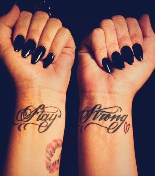 Stay Stron On Wrist And Black Nail Tattoos