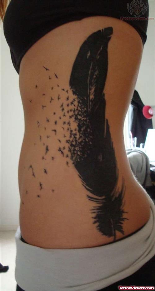 Large Feather Tattoo On Rib