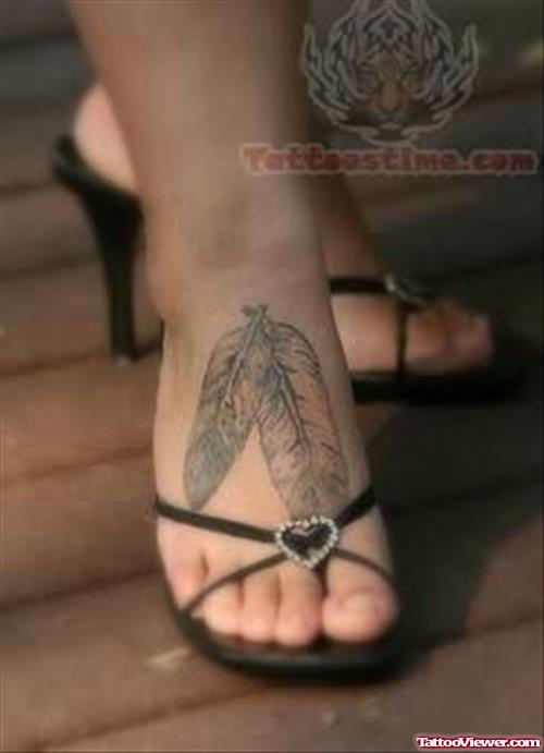 Awesome Native American Feather Tattoo On Foot