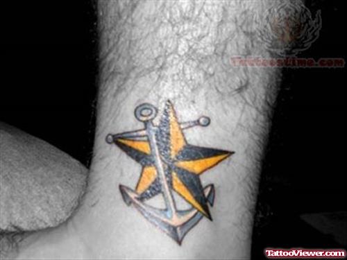 Anchor And Yellow Nautical Star Tattoo