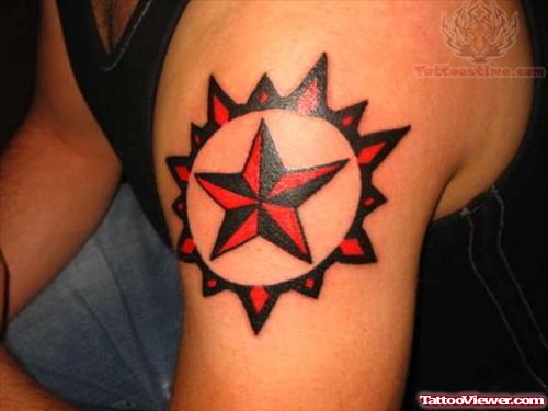 Awesome Nautical Star Tattoo On Biceps