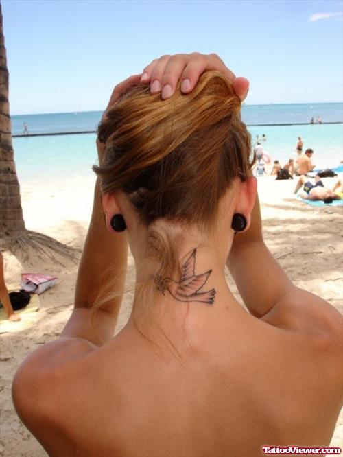 Grey Ink Flying Dove Neck Tattoo