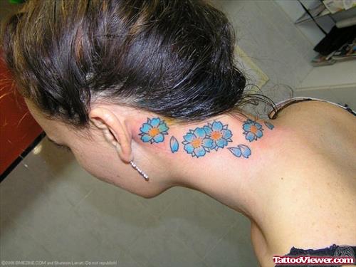 Blue Flowers Tattoos On Back Neck