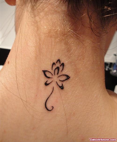 Black Ink Tribal Flower Back Neck Tattoo