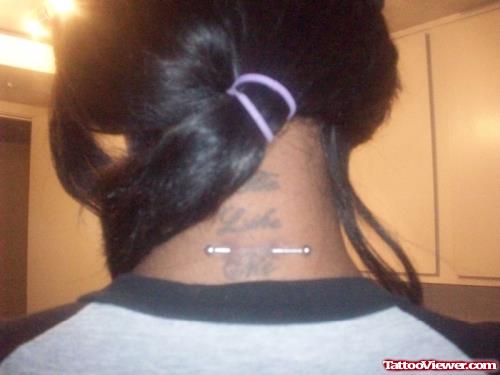 Back Neck Tattoo And Piercing