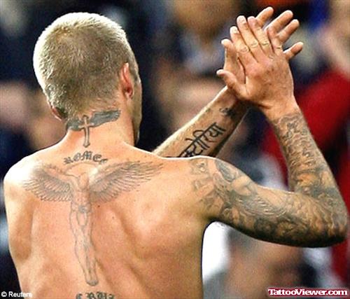 David Beckham With Winged Cross Back Neck Tattoo