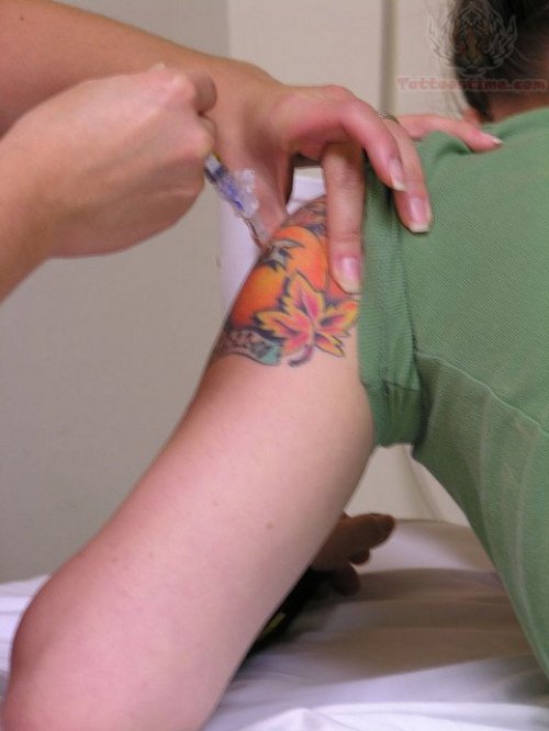 Nurse Syringe Tattoo On Shoulder