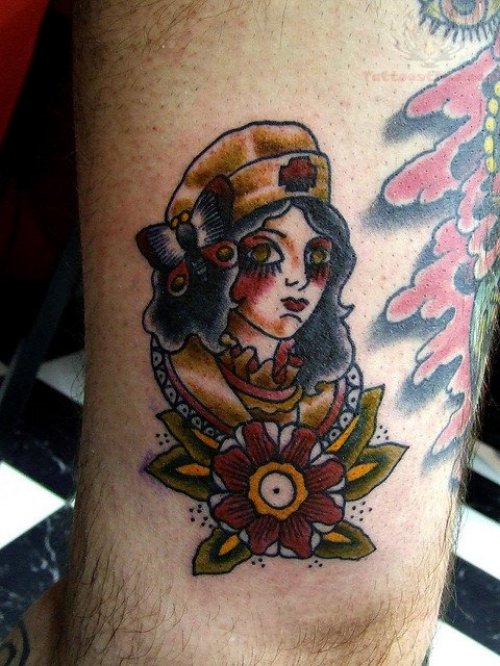 Brown Ink Nurse And Flower Tattoo