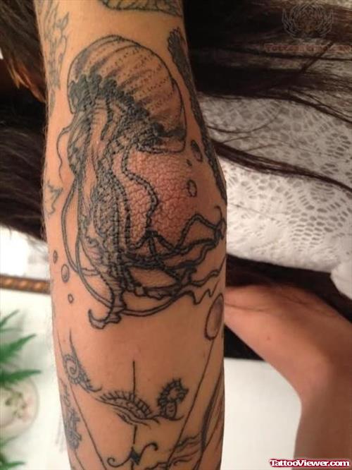 Grey Ink Ocean Star Fish Tattoo On Arm