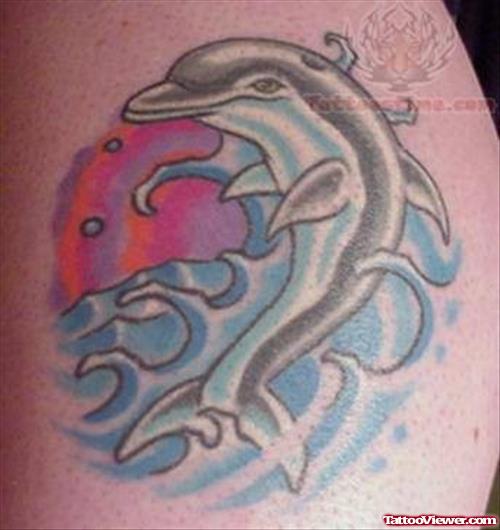 Ocean And Dolphin Tattoo