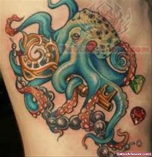 Blue Ink Octopus Tattoo On Rib