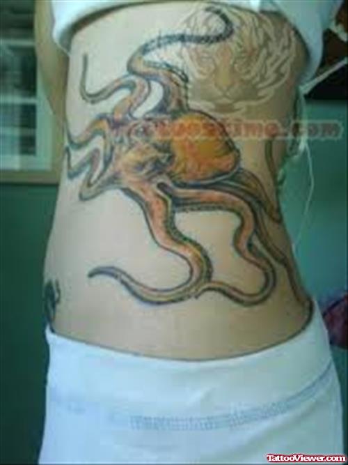 Octopus Tattoo On Girl Rib