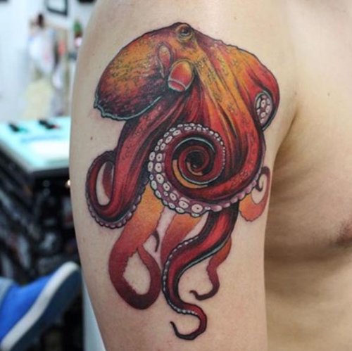 Yellow And Red Octopus Tattoo On Man Right Shoulder