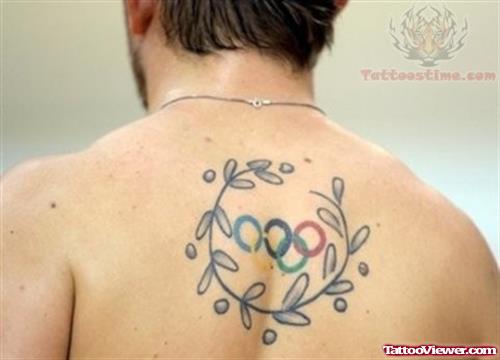 Olympic Rings And Garland Tattoo