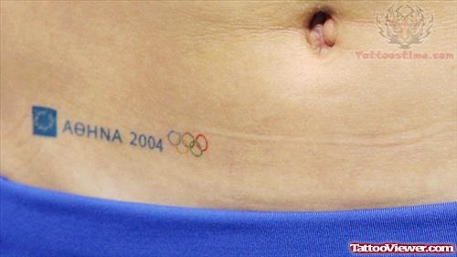 Tiny Olympic Tattoo On Hip