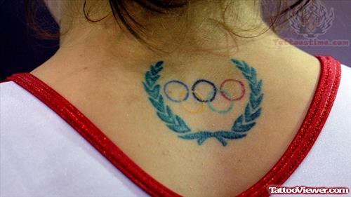 Colorful Olympic Tattoo On Upper Back