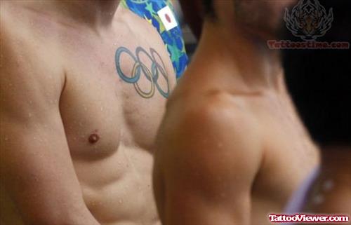 Colored Olympic Tattoos On Chest