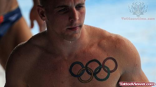 Big Olympic Tattoo On Chest