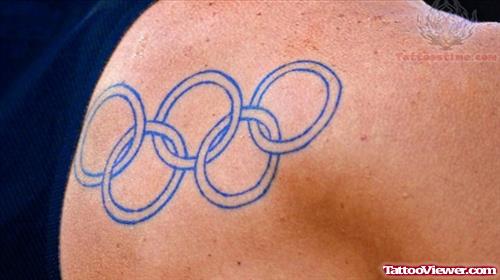 Blue Ink Olympic Tattoo