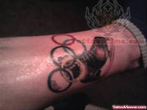 Olympic Ringa And Shoe Tattoo