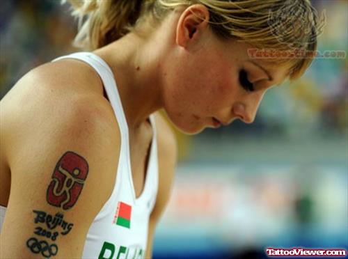 Olympic Tattoo On Athlete Bicep