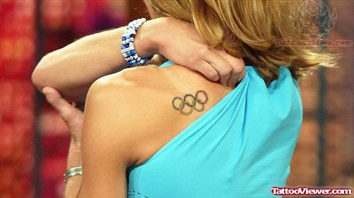 Olympic Tattoo On Girl Back Shoulder