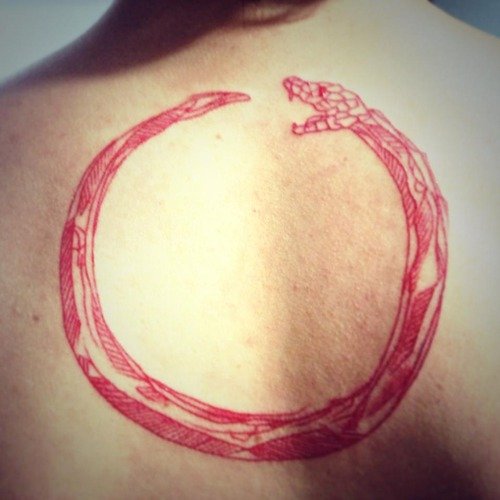 Red Ink Ouroboros Tattoo On Back