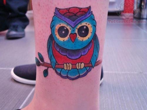 Blue ink Owl Tattoo On Leg