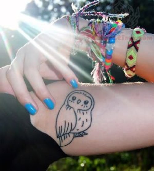 Small Cute Owl Tattoo On Muscle