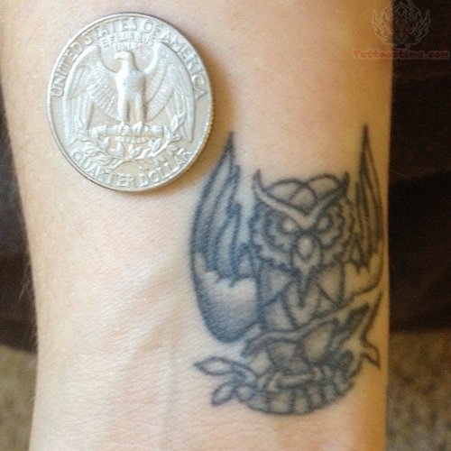 Winged Small Owl Tattoo On Wrist