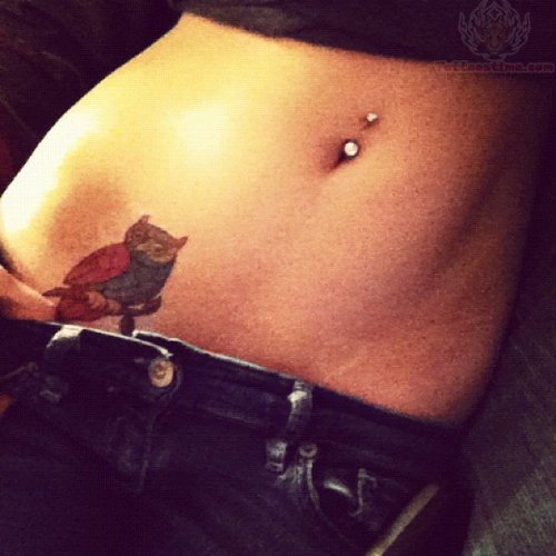 Belly Piercing And Owl Tattoo On Hip