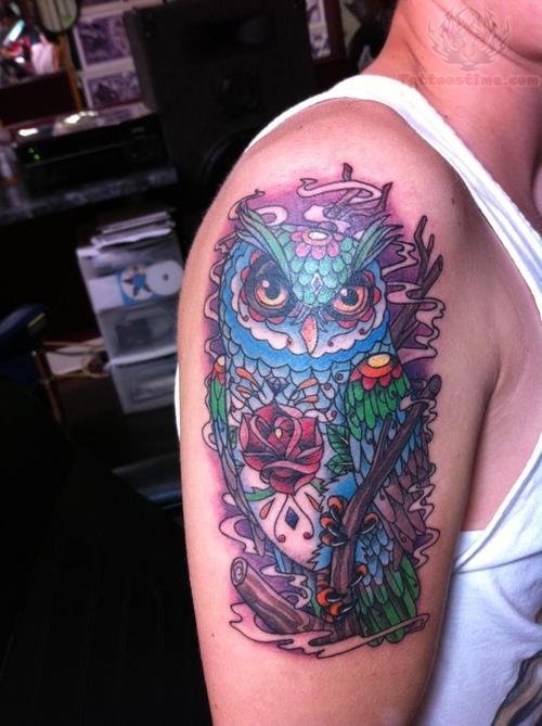 Blue Owl And Rose Tattoo On Bicep