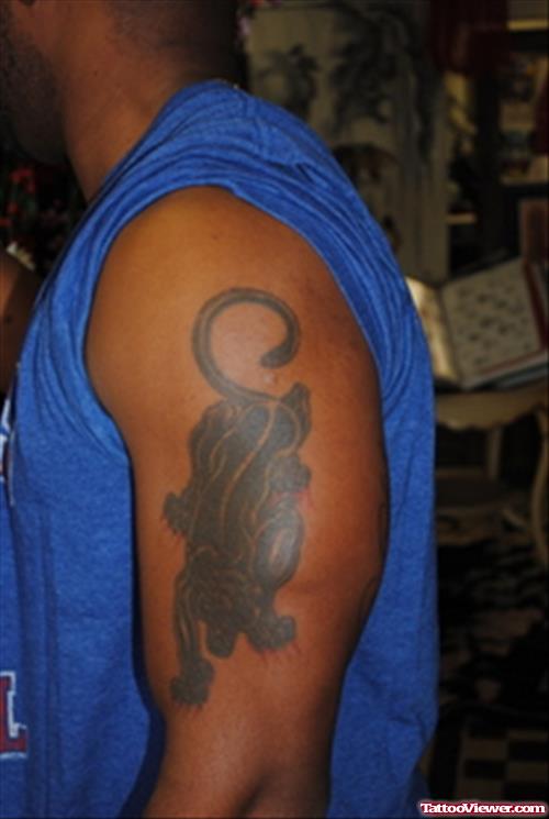 Man Left Bicep Panther Tattoo