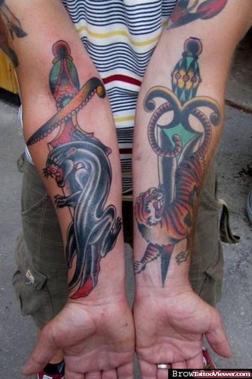 Dagger And Panther Tattoos On Both Forearms