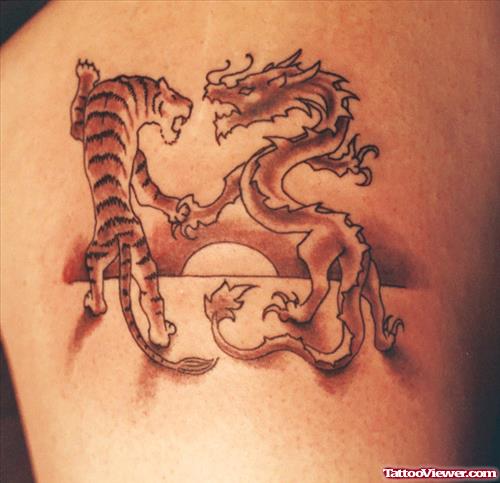 Grey Ink Dragon and Panther Tattoo On Shoulder