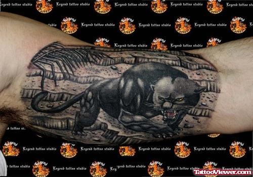 Dark Ink Panther Tattoo On Inner Bicep